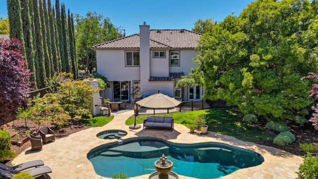 View of the Backyard Oasis of a home in El Dorado Hills, Large pool 